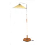A 1960's overhanging floor lamp with an oak and aluminium shaft CONDITION REPORT: