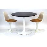 Maurice Burke for Arkana, a pair of 103 chairs together with a similar table,