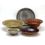 A group of five studio pottery bowls and trays including Wootton Courtenay Pottery,