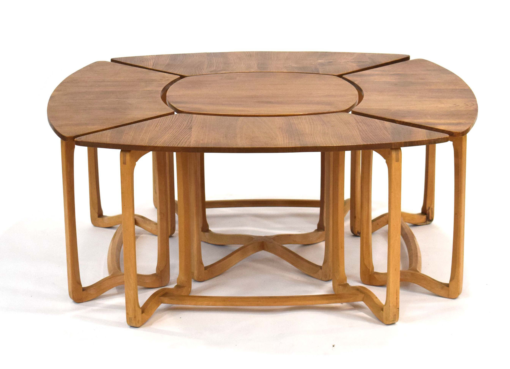 A set of 1960's Ercol Model 515 and 516 supper occasional tables in elm and beech,