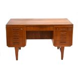 A 1960's Danish teak and crossbanded desk,