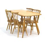 A modern Ercol oak dining set including a cushioned rectangular table, 152 x 72 cm,