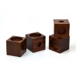Two pairs of cuboid candle holders with various sized compartments, w.