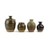 John Mathieson, a stoneware pottery vase, the green ridged ground with three miniature handles,