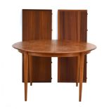 A 1960's Danish teak and crossbanded extending dining table with two fitted leaves, 122 to 222 cm,