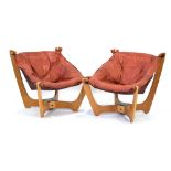 A pair of 1960/70's lounge chairs,