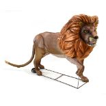 An exterior exhibition life-size figure modelled as a lion, the wirework body covered with fabric,