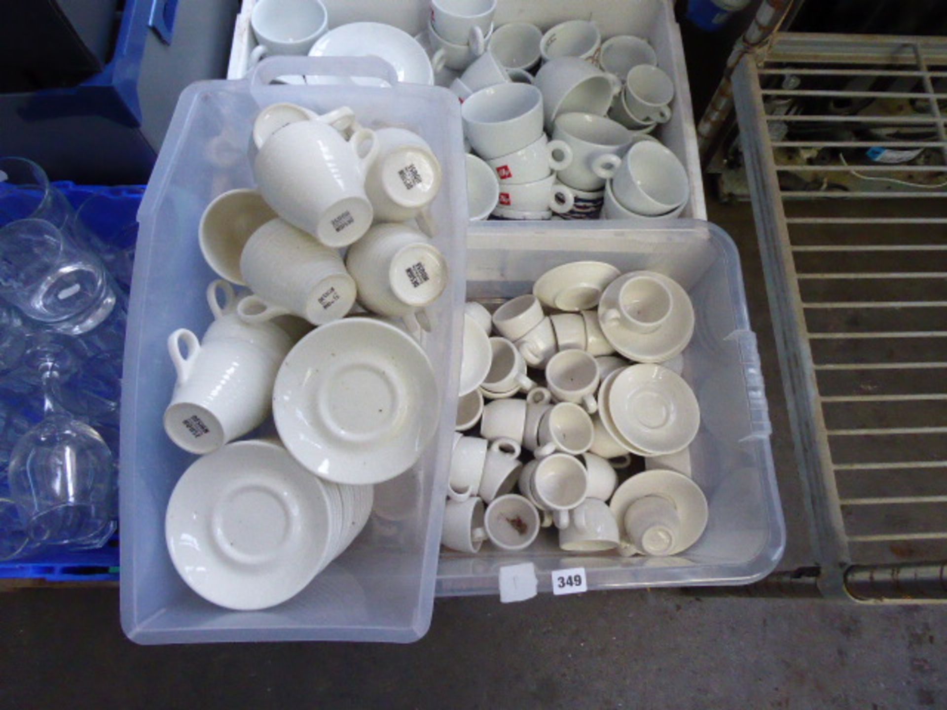 4 trays of white coffee cups and saucers