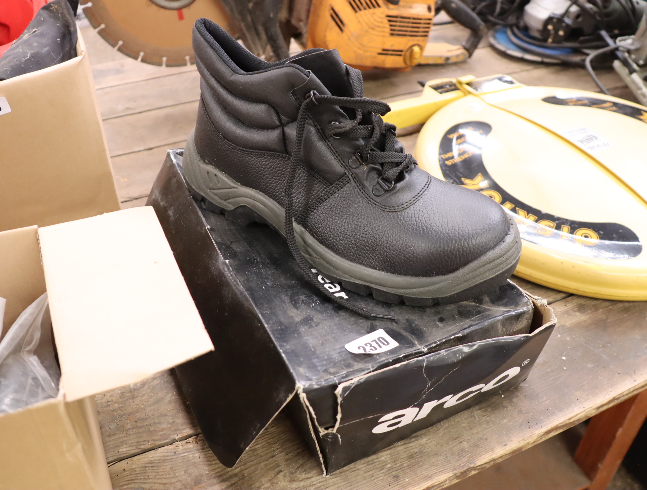 Pair of echo safety boots in black, size UK 11