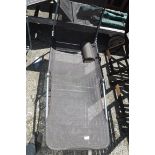 Brown mesh sun lounger