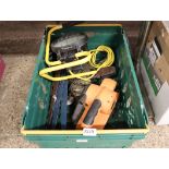 Green crate containing hinges, electric sander, work light and electric drill