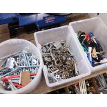 Box of bungee straps with box of various screws and bucket of bolts and washers