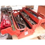 Red toolbox containing mixed tools incl. spanners, screwdrivers, allen keys, etc.