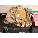 Crate of camouflage clothing and equipment