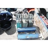 3 metal jerry cans with blue toolbox