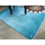 Graduated blue patterned rectangular rug