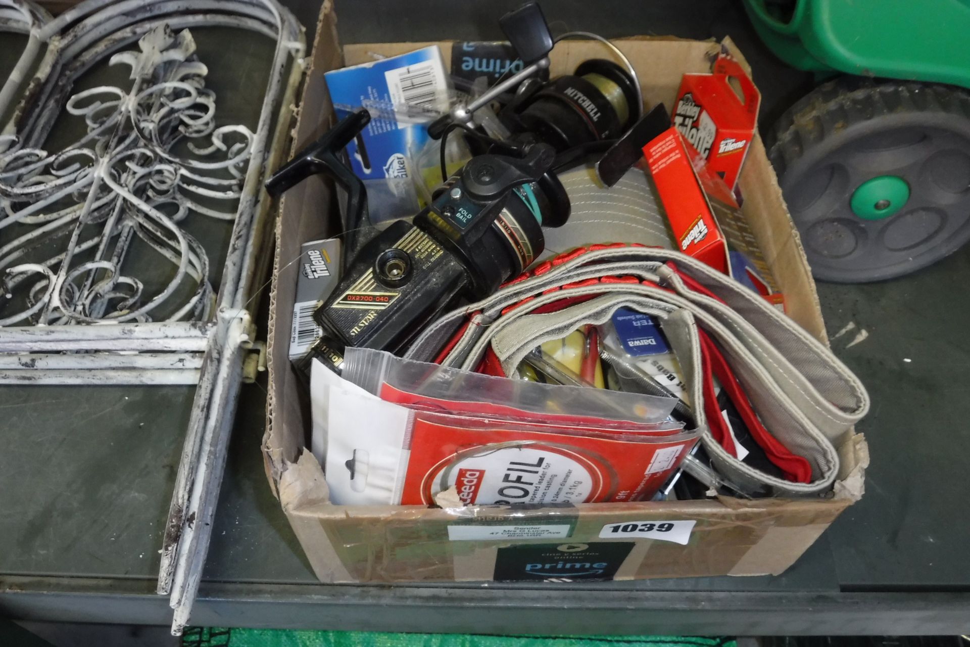 Small box containing fishing items incl. Sil Star fishing reel, Mitchell fishing reel, tapered