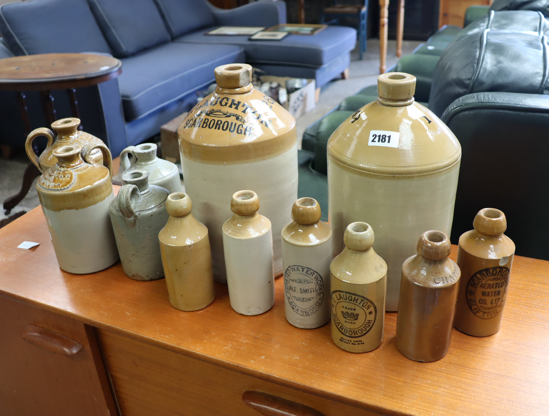 Quantity of earthenware brewery bottles incl. Burton United, T. Laughton, Scarborough and various