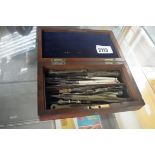 Wooden cased set of drawing compasses