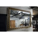 Rectangular gilt framed and bevelled wall mirror