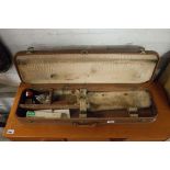 Small fur lined Browning gun case with various accessories including a trigger pull gauge