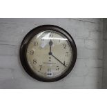 Mahogany cased circular wall clock by Smiths Clocks & Watches Ltd, London, 1957