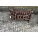 2 small cast iron fire grates