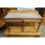 Mid Century teak coffee table in the manner of Gordon Russell with two smaller coffee tables