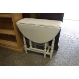 White painted drop leaf oval occasional table