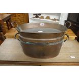 Copper twin handled cooking pot with detachable upper tray section