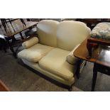 Mahogany framed two seater sofa with cane infilled side panels, beige upholstered back and similar