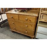 Pine chest of two over two drawers on turned feet