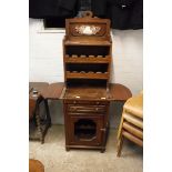 Mahogany bottle cupboard with single drawer and further decorative shelf section above