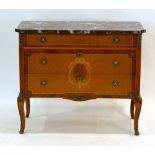 A reproduction commode, the rouge marble surface over three walnut, marquetry and strung drawers,