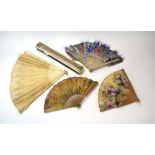 A group of five lace and other hand fans including two bone examples