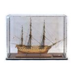 A model of HMS Ajax shown under repair, completed in 2004, in a perspex case,