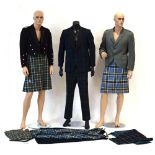 A group of tartan clothing including a suit, two gentleman's kilts, two ladies kilts,