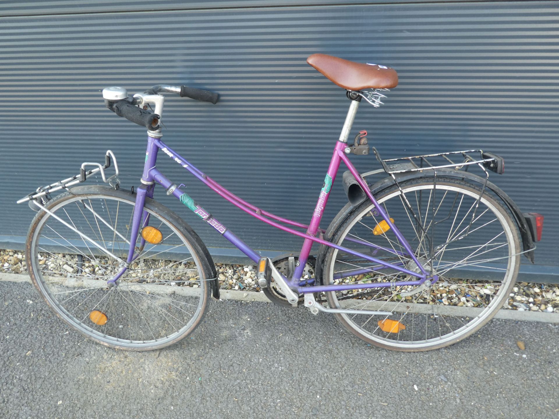 Pink and purple ladies bike