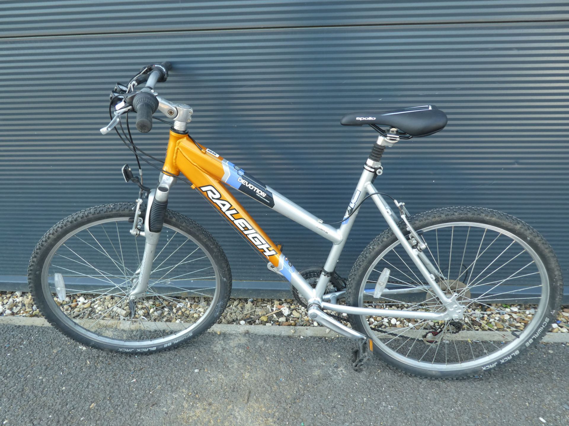 Raleigh orange and silver mountain bike