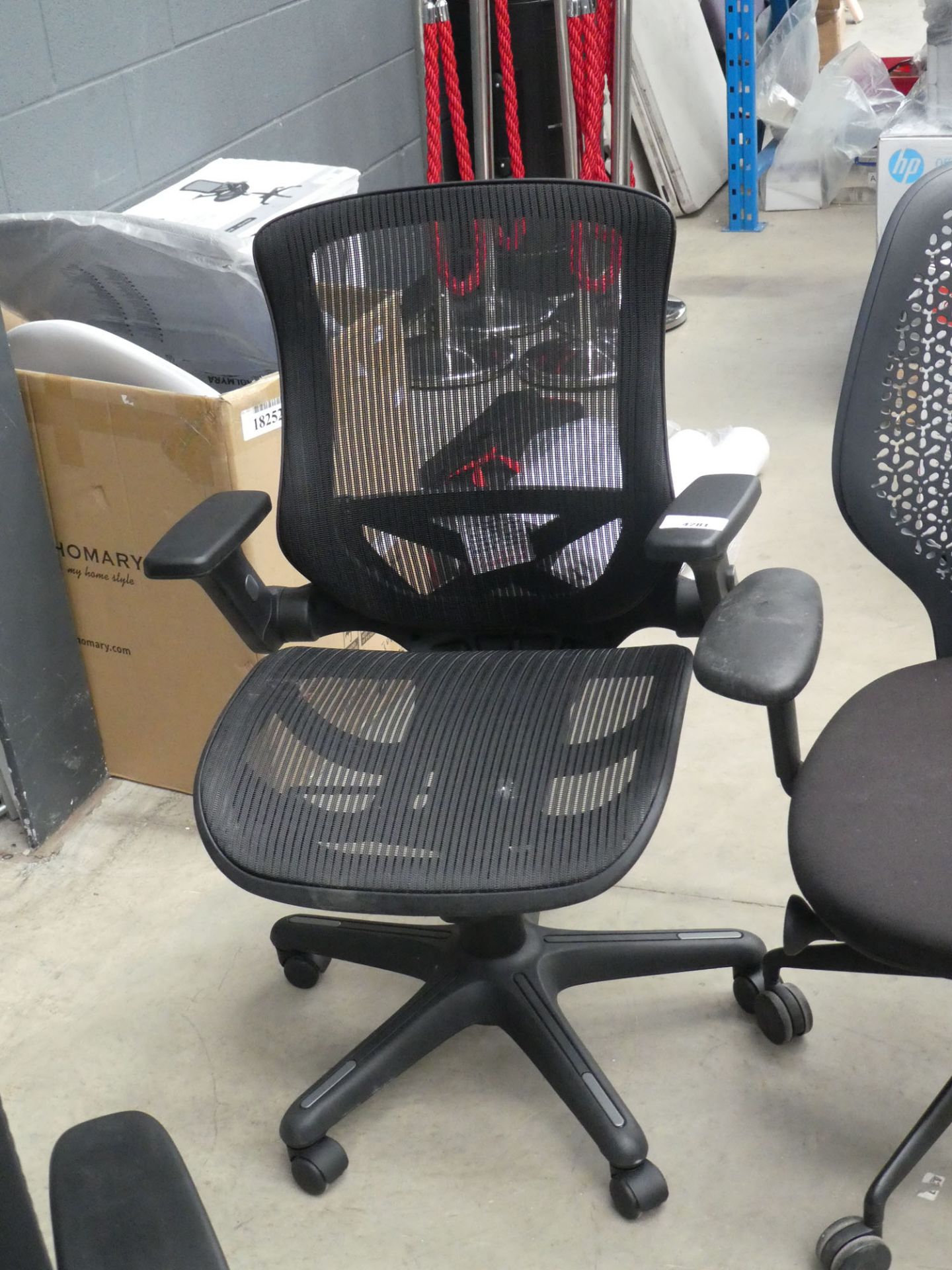 Black mesh swivel armchair