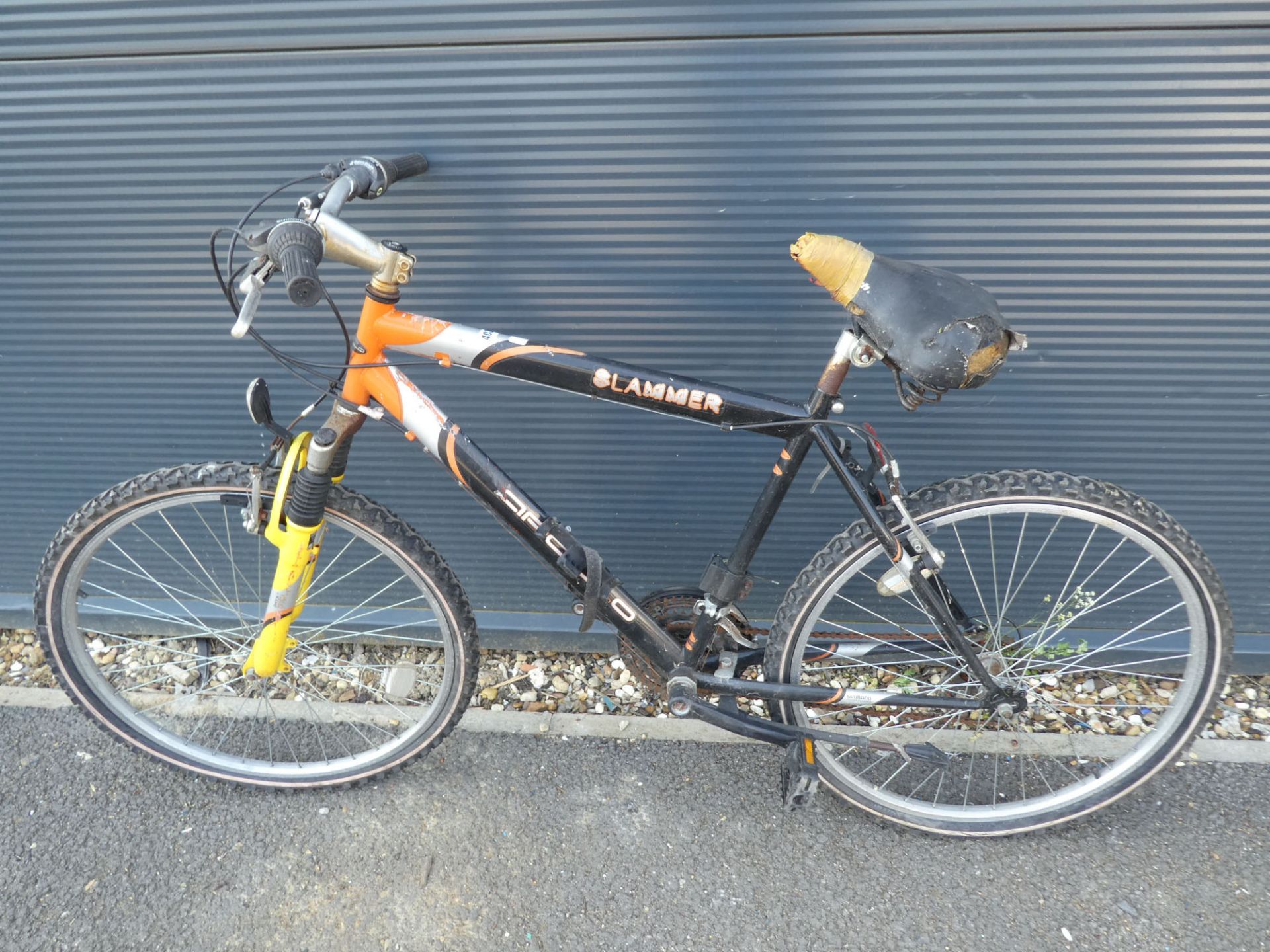 Black and orange Apollo Slammer gents mountain bike