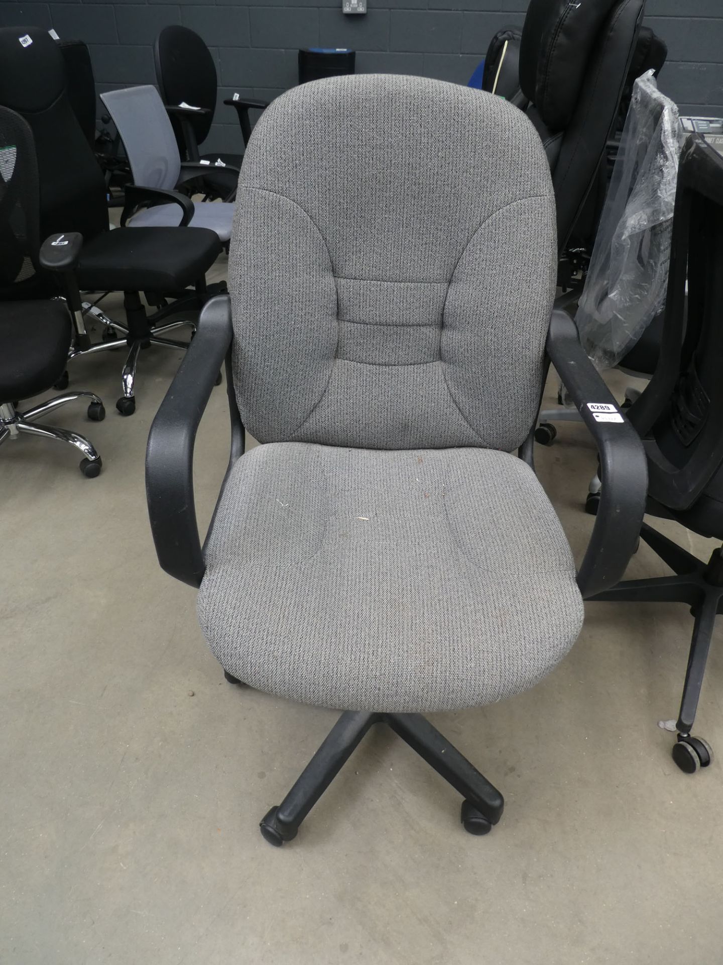 Grey cloth swivel chair