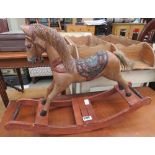Small decorative wooden rocking horse