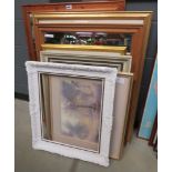 Large quantity of framed and glazed prints together with empty frames, and mirrors