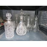 Cage of glass decanters, one silver mounted