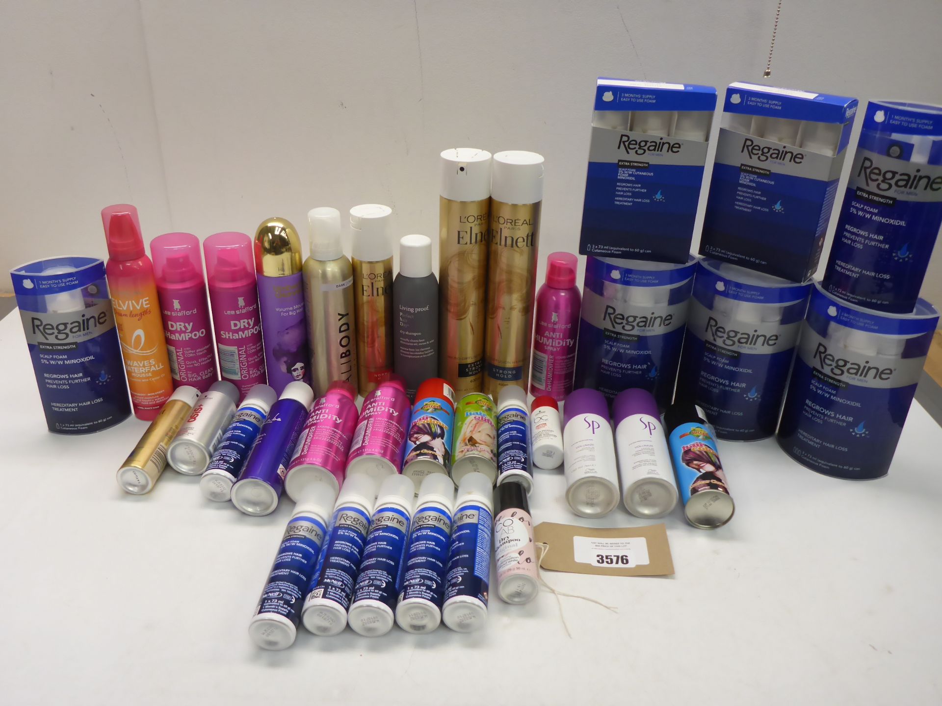 Selection of hair products including dry shampoo, hair spray, Regaine, mousse etc