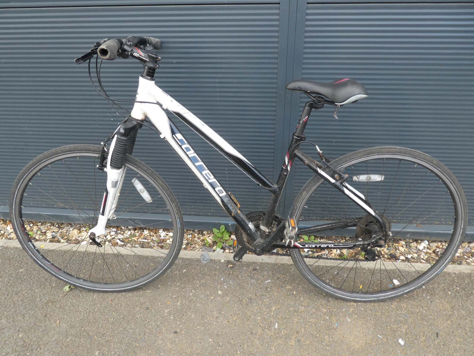 White and black Carrera town bike