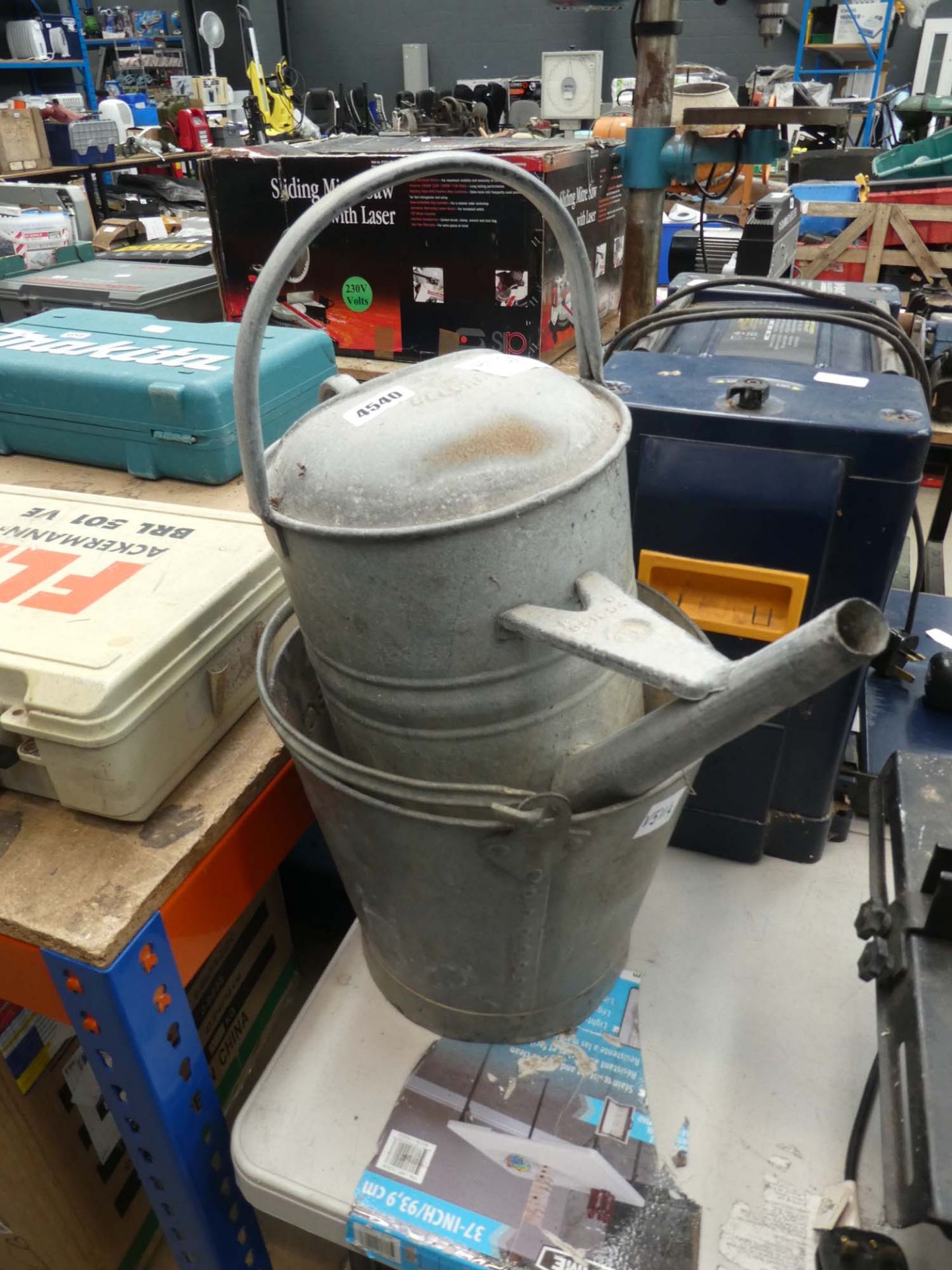 Galvanised bucket and watering can