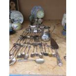 Quantity of souvenir spoons, napkin rings, silver plated milk jug, salt and pepper set, glassware