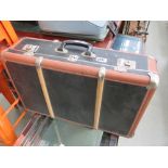 Suitcase plus vintage film projector